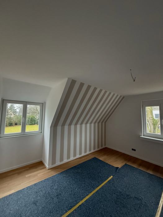 Malerarbeiten in einem Einfamilienhaus von Hoffmann Bau