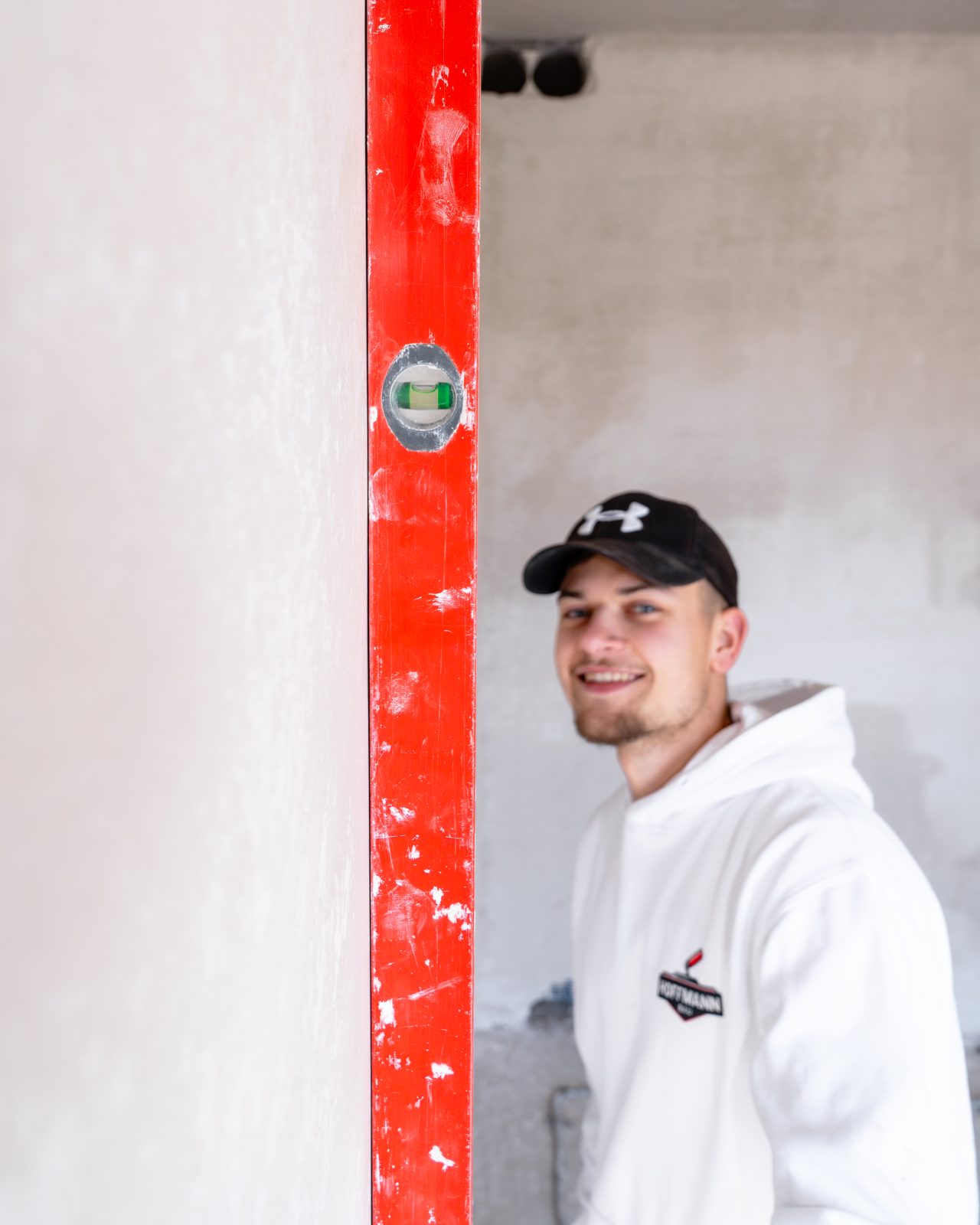 Hoffmann-Bau-Handwerker bei der Arbeit auf der Baustelle